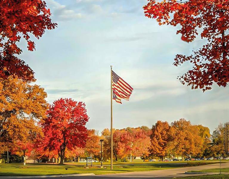 USA and Ohio flag with fall campus scene