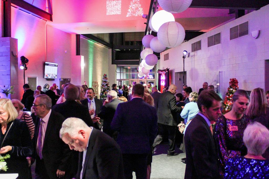 Guests attend the 2024 Holiday Evening at Edison State