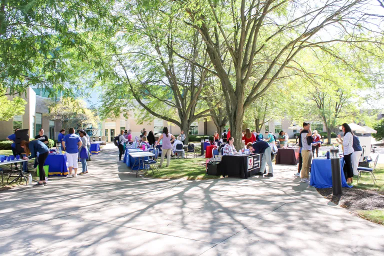 Student resource fair in the courtyard of the Piqua Campus during the Welcome Back Bash for Edison State students.