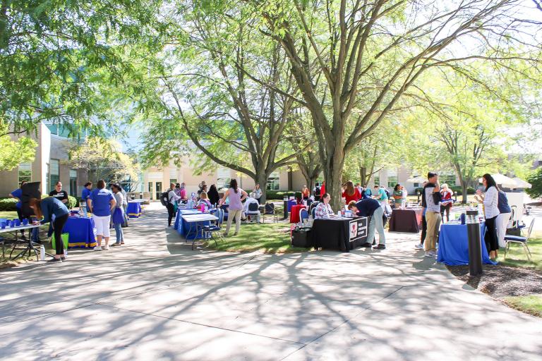Student resource fair in the courtyard of the Piqua Campus during the Welcome Back Bash for Edison State students.