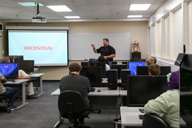 Honda presenting to classroom of students
