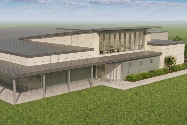 3D architectural rendering of Edison State Community College health sciences addition featuring a modern commercial building with angled metal roofs, floor-to-ceiling windows, contemporary exterior panels, and landscaped grounds.
