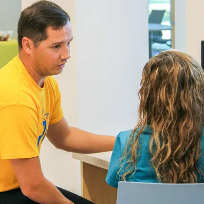 Student speaking to instructor