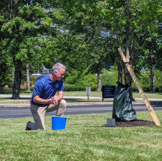 Chris S. planting tree