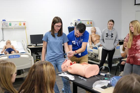 Women in STEMM Expo participants learn about respiratory care.