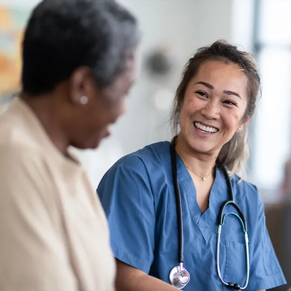  Nurse Interacting With Patient 