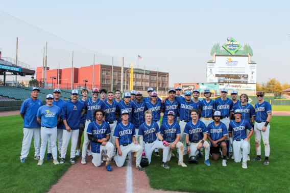 The 2024-25 Charger baseball team poses during the 2024 Charger Country Showcase at Dayton Dragons stadium.