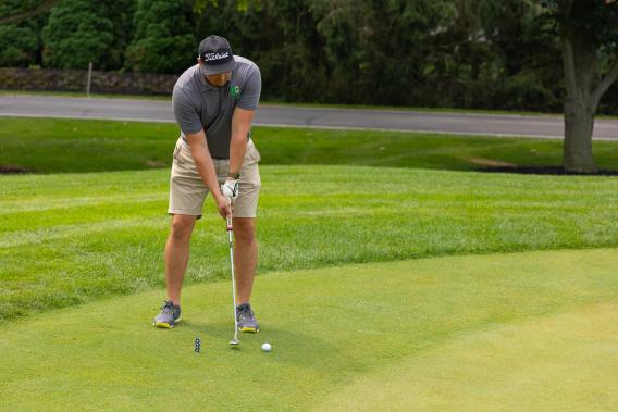 Golfer participating in the 2025 Drive for Scholarships event